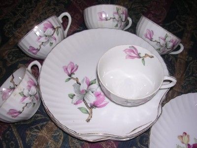 Measurements plates 8 w x 8 h; cups 3 3/4 diameter x 2 1/2 t