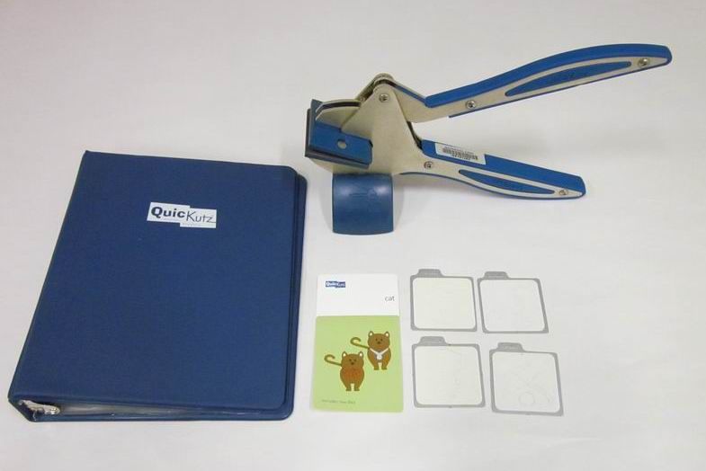 QUICKUTZ Hand Tool with Stand & Binder / Also Includes A Couple Dies 